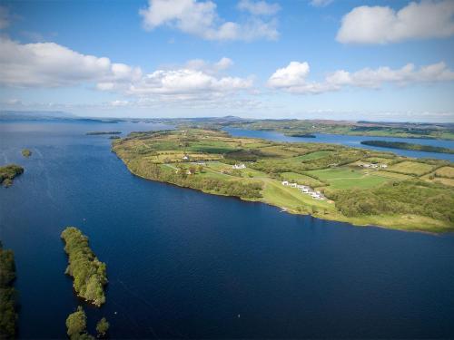 an aerial view of a large body of water at Executive Lakeside Lodge at Mullans Bay in Kesh