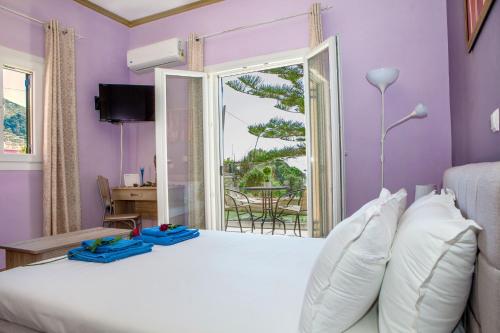 Postel nebo postele na pokoji v ubytování FilipposResort