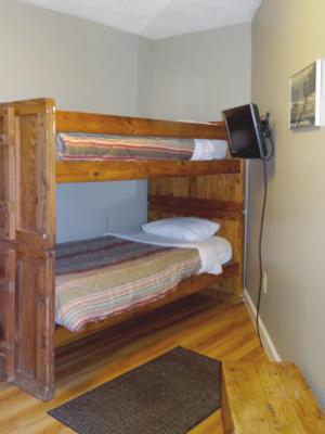 a room with two bunk beds in a room at Winterplace Condo Ski in Ski out First Floor E102 in Ghent