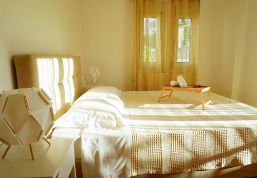 Katil atau katil-katil dalam bilik di Nectar Apartments