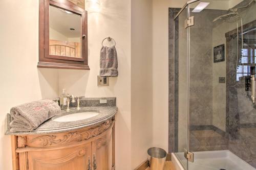 a bathroom with a sink and a shower at Timeless Red Sox Retreat with Scenic Mountain Views! in Putney
