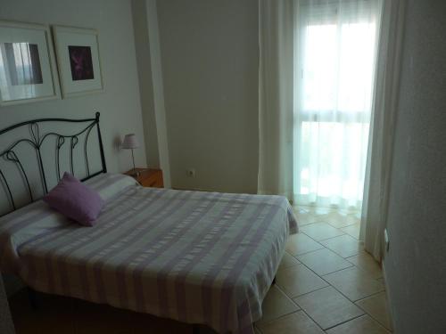 Postel nebo postele na pokoji v ubytování JOYAPARTMENTS Gavina D´Or