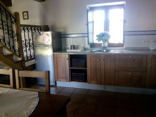 Kuchyň nebo kuchyňský kout v ubytování Casa Crisanta