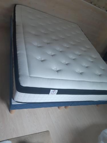 a mattress on a bed frame on a floor at Suite Privée Bed and Breakfast in Nîmes