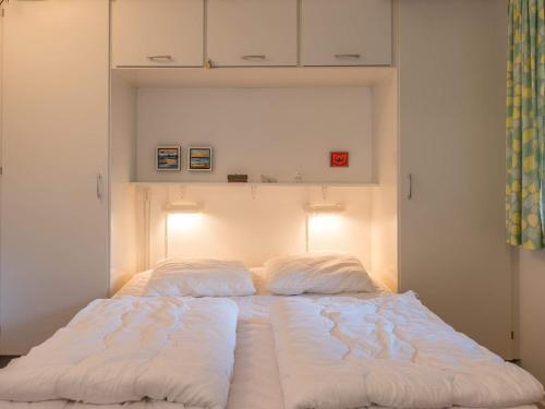 Postel nebo postele na pokoji v ubytování Holiday home Fanø LIII