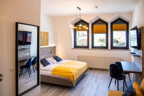 Postel nebo postele na pokoji v ubytování City Hotel Bamberg
