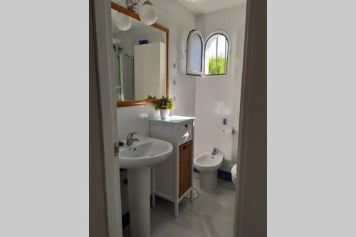 Ett badrum på apartamento Costa Sancti-Petri La Barrosa Chiclana