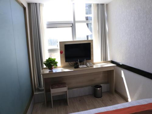 Gallery image of JUN Hotels Gansu Lanzhou Lanzhou New District Jing'er Road Asia-Pacific World Trade Center Square in Lanzhou