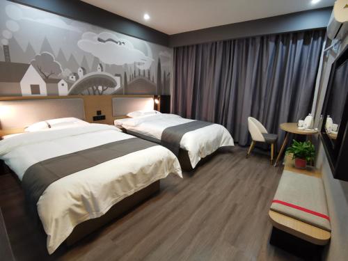 Posteľ alebo postele v izbe v ubytovaní Thank Inn Chain Hotel Shanxi Changzhi Lihou County Lihou Ancient City