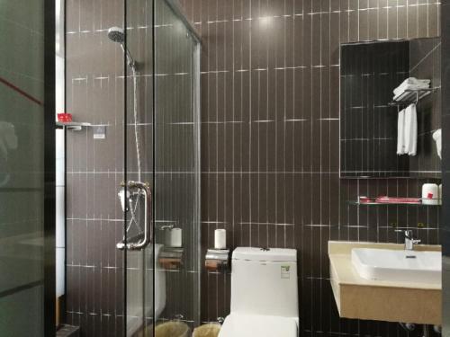 Ванна кімната в Thank Inn Chain Hotel Changzhi Qingyang Manor