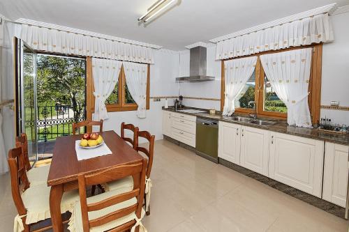 Dapur atau dapur kecil di Alojamiento extrahotelero casa Ernestina
