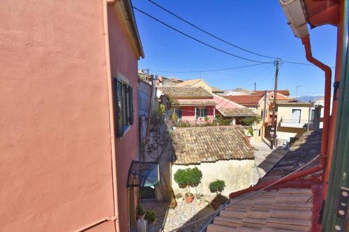 an overhead view of an alley with buildings at Traditional House with Amazing View in Chlomós
