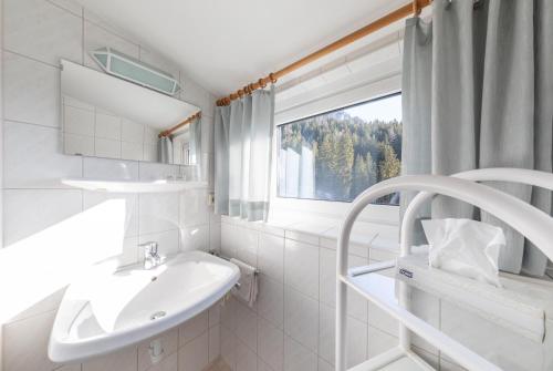 Koupelna v ubytování Alpenhof