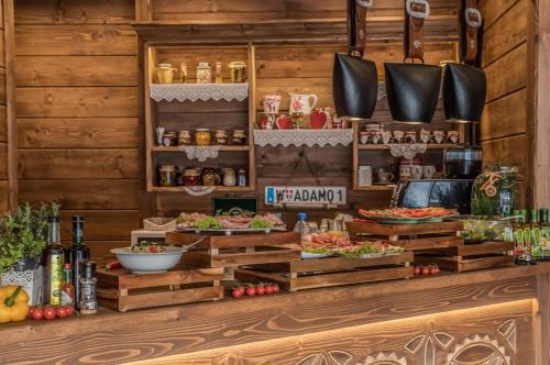 a buffet in a restaurant with food on display at Villa Adamo & Relax in Zakopane