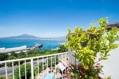 a balcony with a view of the water at Relais Manfredi in Castellammare di Stabia