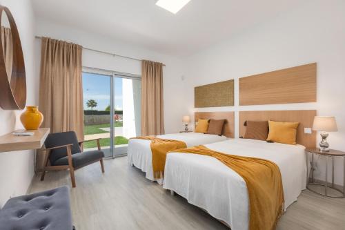 Ένα ή περισσότερα κρεβάτια σε δωμάτιο στο Villa Alfazema - heatable pool