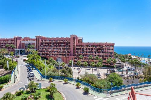 an aerial view of a resort and the ocean at Holiday World Polynesia in Benalmádena