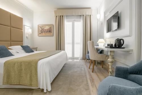 Hotel Pirineos Figueres by Pierre & Vacancesにあるベッド