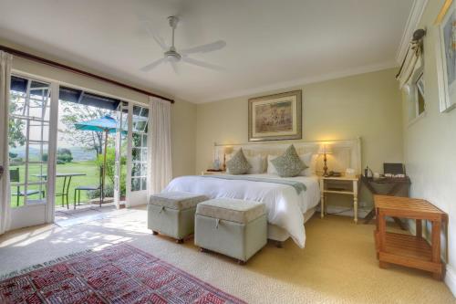 Katil atau katil-katil dalam bilik di Moorcroft Manor Boutique Country Hotel