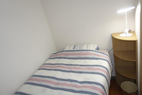 Afbeelding uit fotogalerij van Taro's Hostel Minami Koshigaya in Koshigaya