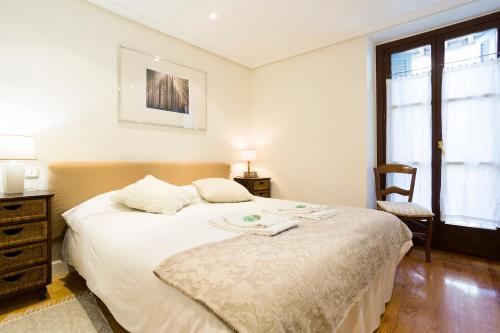 Llit o llits en una habitació de Txoriak - Basquenjoy