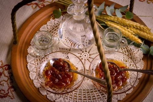 a table with two dishes of food on a plate at Traditional Windmill-Milos in Kroústas