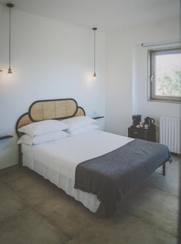 Ένα ή περισσότερα κρεβάτια σε δωμάτιο στο Casa Ziazì Room e Nature
