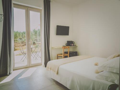 Cama o camas de una habitación en Casa Ziazì Room e Nature
