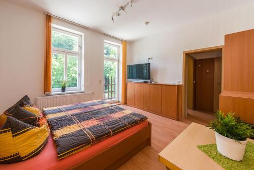 Voodi või voodid majutusasutuse Numero1-Pension und Cafe toas