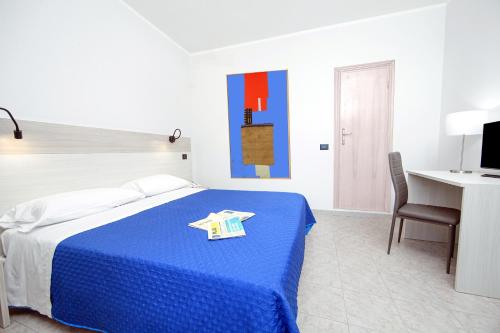 Cama o camas de una habitación en Hotel Venezia