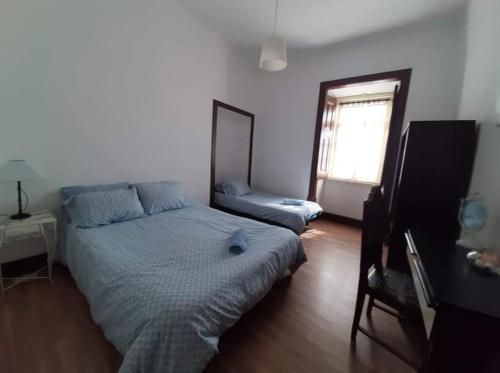 Katil atau katil-katil dalam bilik di Quarto & Pasta Guesthouse