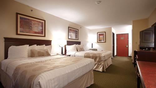 Krevet ili kreveti u jedinici u okviru objekta Best Western Jacksonville Inn