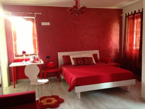 Łóżko lub łóżka w pokoju w obiekcie B&B Oro Puro