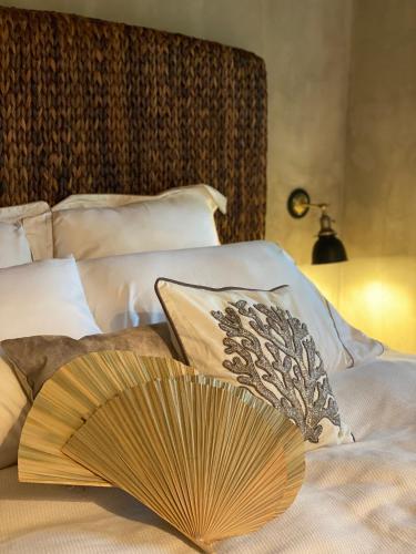 Postel nebo postele na pokoji v ubytování ADAN RESORT HANALI village sesokojima