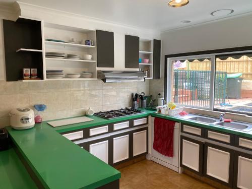 Una cocina o cocineta en ADA Homestay