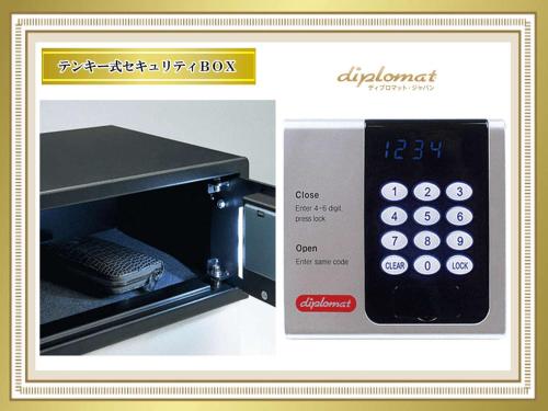 a picture of a microwave with a calculator on it at Astil Hotel Juso Precious in Osaka