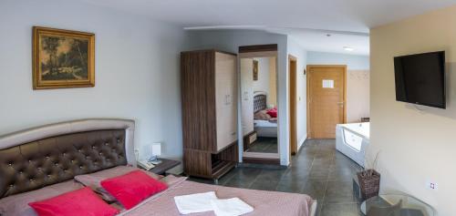Hotel Bella Nellaにあるベッド