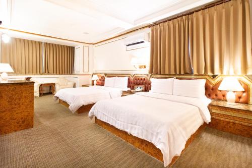 Ένα ή περισσότερα κρεβάτια σε δωμάτιο στο Baron's Hot Spring Hotel