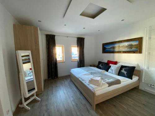 Ένα ή περισσότερα κρεβάτια σε δωμάτιο στο Residence Cosy