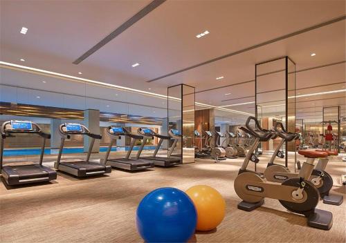 a room filled with lots of different types of sports equipment at NUO Hotel Beijing in Beijing