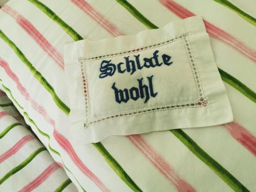 a napkin with the words solitude model written on it at Ferienwohnung Morgensonne in Schützen am Gebirge