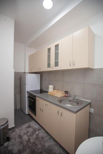 Cuina o zona de cuina de Apartman Đurica