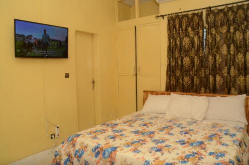 Postel nebo postele na pokoji v ubytování Hotel Ambassadors