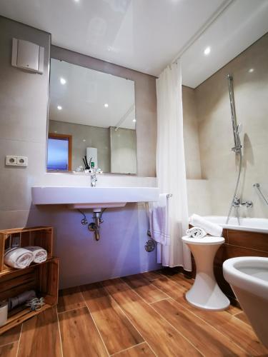 Ένα μπάνιο στο Park Appartements