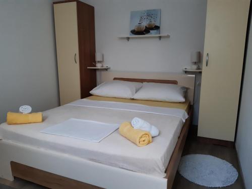 Postel nebo postele na pokoji v ubytování Guest House Sonja