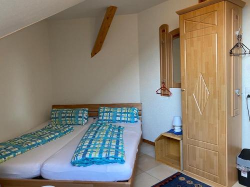 a bedroom with two beds in a room at Haus Stegmeir in Hohenweiler