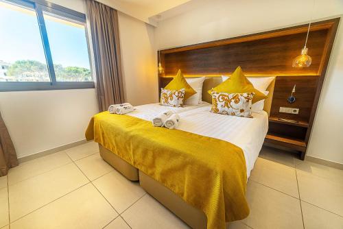 Ένα ή περισσότερα κρεβάτια σε δωμάτιο στο Hotel Paradise Residencial