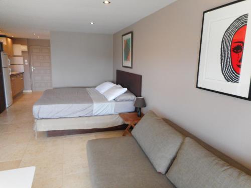 Postel nebo postele na pokoji v ubytování Studio vue mer Residence Mont Vernon