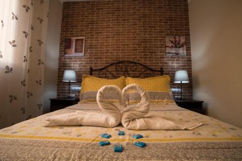A bed or beds in a room at Casa Manel, La Gomera