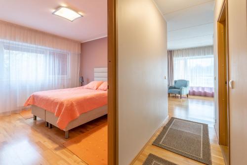 Katil atau katil-katil dalam bilik di Tähe Apartment